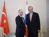 Vladimir Putin e Recep Tayyip Erdogan (San Pietroburgo, 9 agosto 2016). Foto Afp/SIR