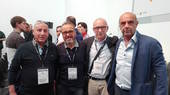  Nella foto al centro il presidente Carlo Gasperini e il coordinatore sindacale Gabriele Savoia con due altri partecipanti alla iniziativa