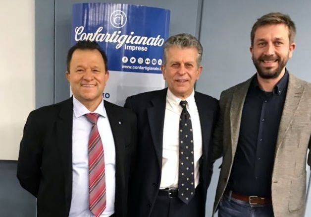 Nella foto Luca Facciani, primo a destra, Amedeo Genedani al centro e Valerio Cangini, ex presidente di Confartigianato Trasporti Cesena