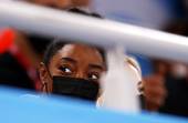 epaselect epa09376480 US Gymnast Simone Biles watches from the stands at the start of the Women's All-Around final during the Artistic Gymnastics events of the Tokyo 2020 Olympic Games at the Ariake Gymnastics Centre in Tokyo, Japan, 29 July 2021. EPA/HOW HWEE YOUNG