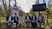 I relatori della conferenza stampa di oggi, tra i ciliegi di un'azienda agricola di Vignola (Modena)