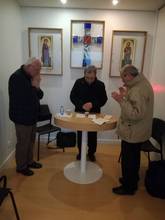 Da sinistra, don Sauro Bagnoli, il vescovo Douglas e don Walter Amaducci ieri all'aeroporto di Parigi mentre celebrano la Messa 