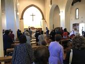 Un momento dei funerali di Alex Cucchi, al termine della Messa, questa mattina in chiesa a Calisese di Cesena