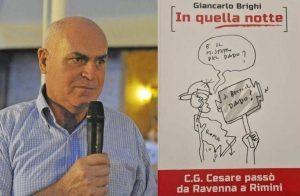 Nella foto, il professor Giancarlo Brighi con accanto uno dei suoi libri